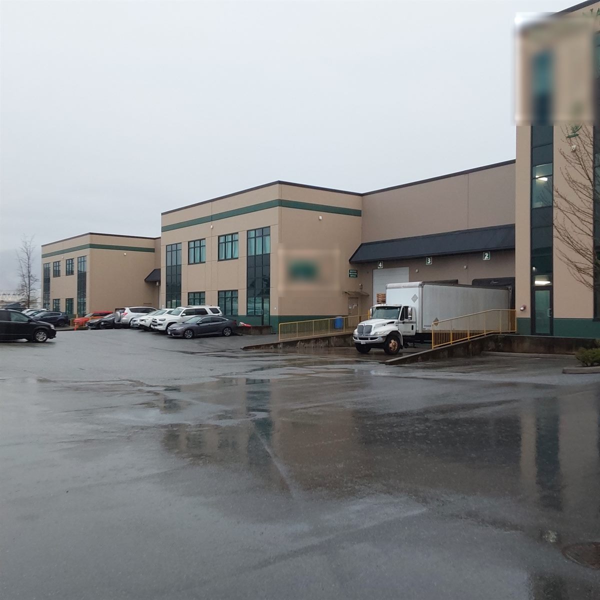 Two-storey light-industrial building with loading bays, Coquitlam