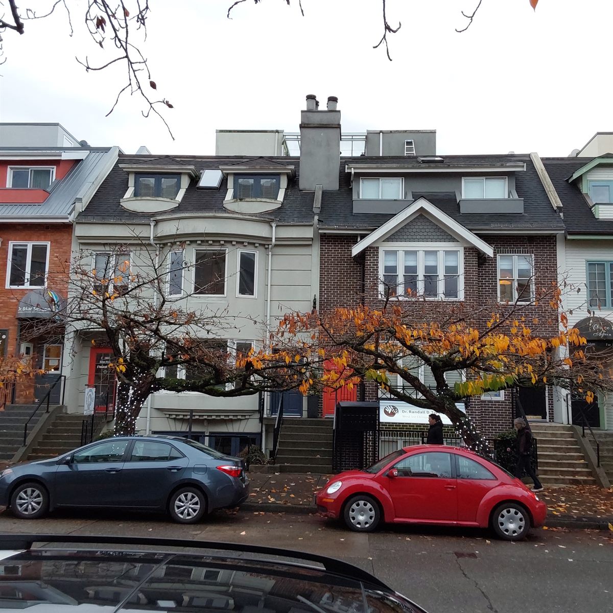 Older character low-rise homes along a street, Vancouver
